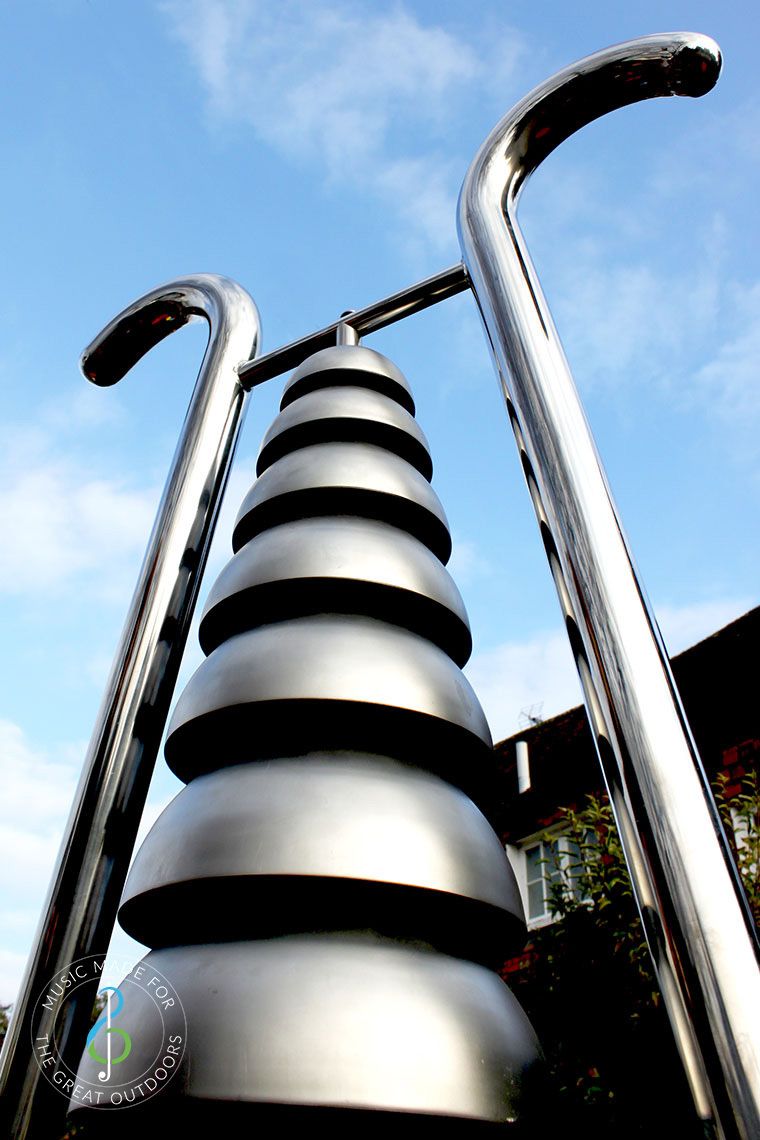 Close Up of Large Stainless Steel Bell Lyre Outdoor Chime