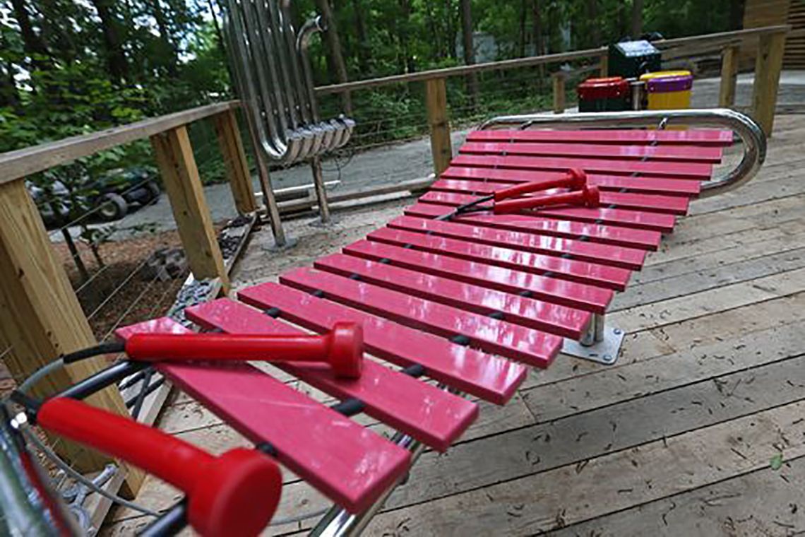 pink outdoor marimba in playground area