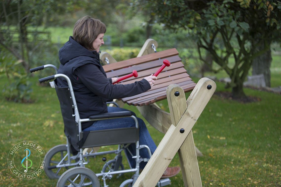Lady in Wheelchair Playing Outdoor Akadinda 