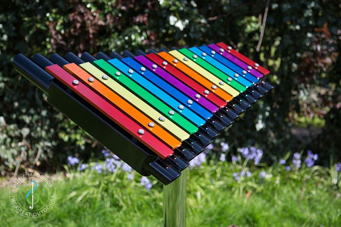 Large Xylophone Outdoors With Rainbow coloured Notes